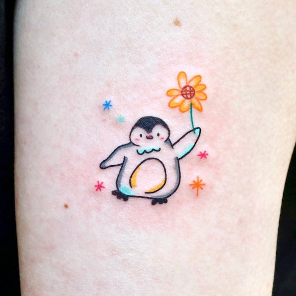 Cute penguin and sunflower tattoo by @soy_tattoo