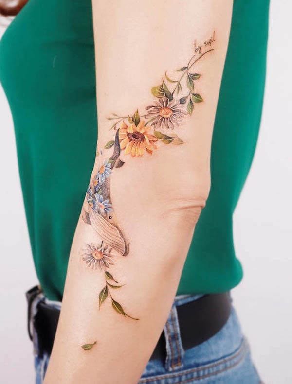 Floral whale and flowers tattoo by @sozil_tattoo