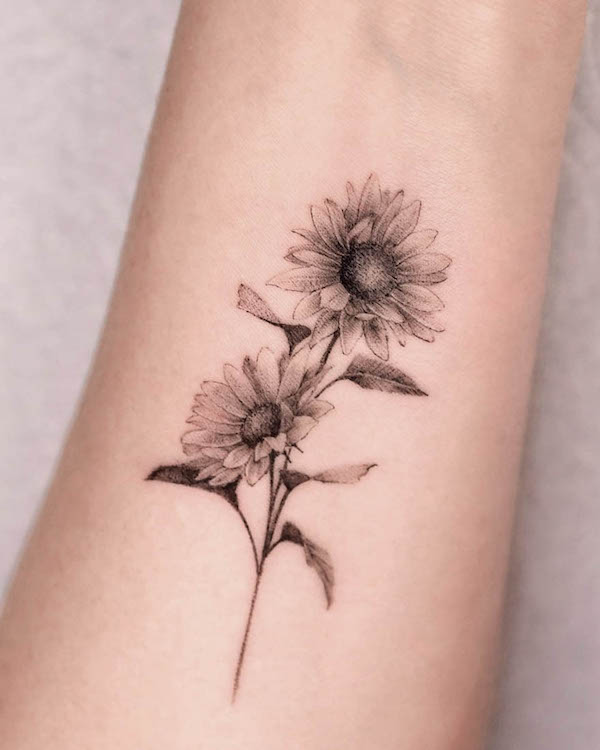 Greyscale sunflower tattoo by @tattooist_gaon