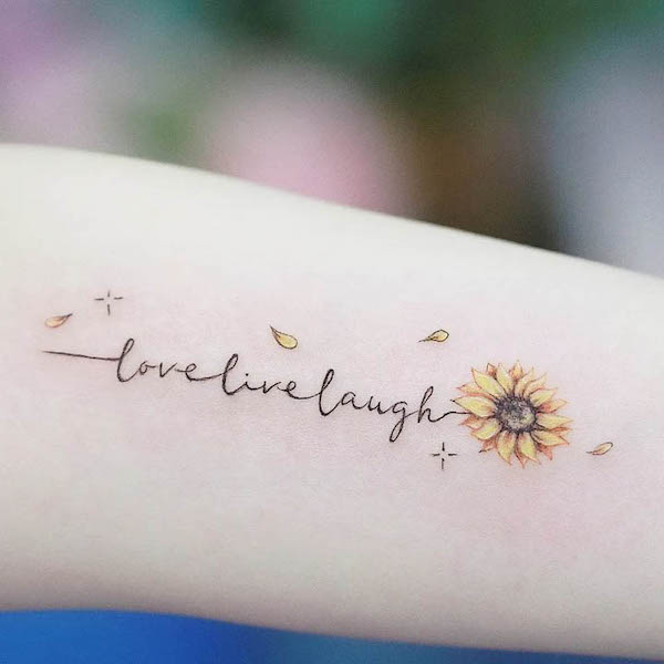 Live laugh love sunflower script tattoo by @cherri_art.tattoohk