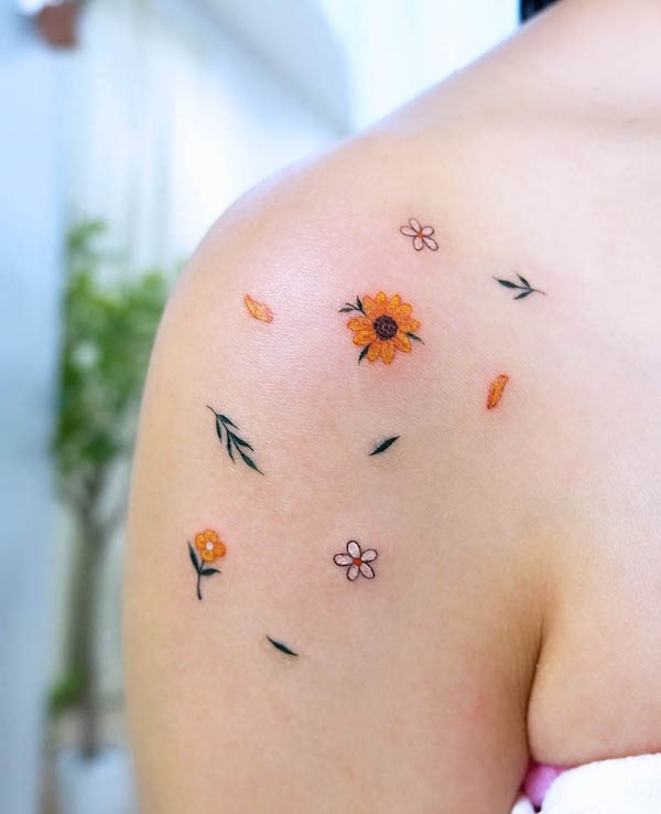 Petals and flowers patchwork tattoo by @seon_tattoo