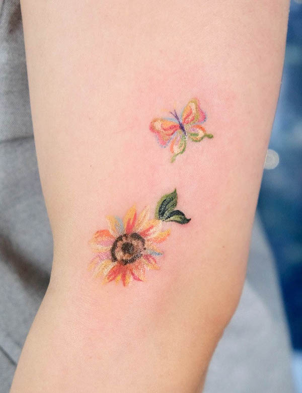 Watercolor sunflower with butterflies by @pagwa_tattoo