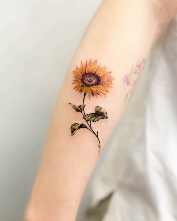 Simple sunflower forearm tattoo by @g9in_ttt