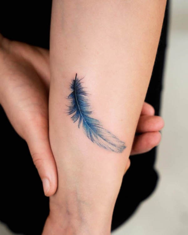 blue feather tattoo  Trendy tattoos Feather tattoos Tattoo designs