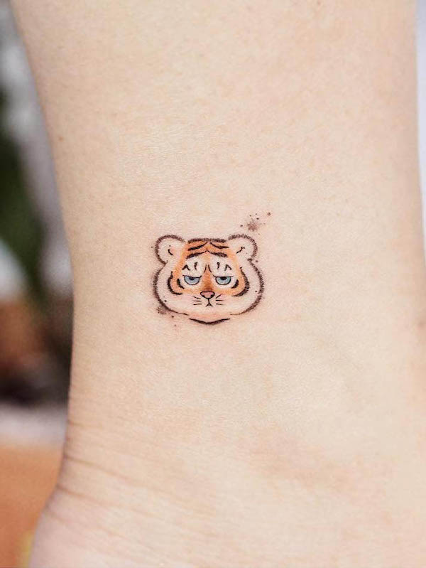 Cute small tiger ankle tattoo by @minie._.chan