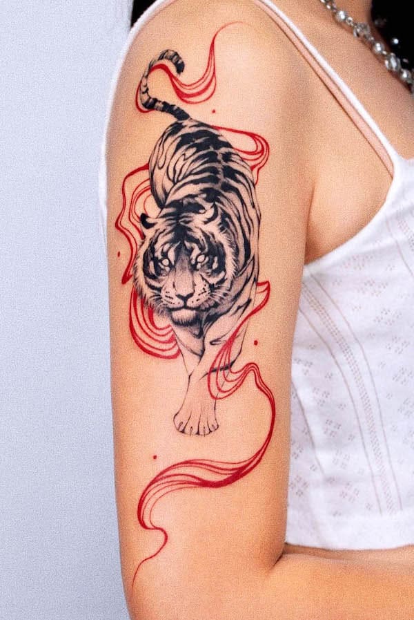 Elegant white tiger half-sleeve tattoo by @sansa.jr.tattoo