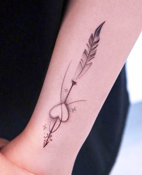 Feather and arrow tattoo by @tattooist_giho_