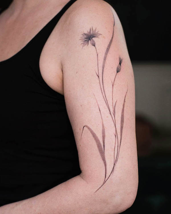 Fine line botanical sleeve tattoo by @m_inspirada