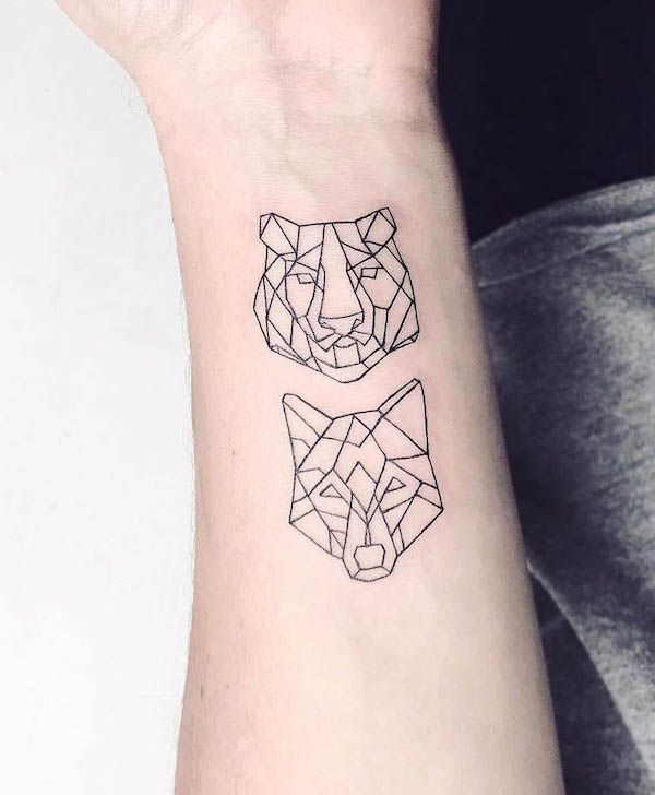 Geometric tiger and wolf tattoo by @nothingwildtattoo