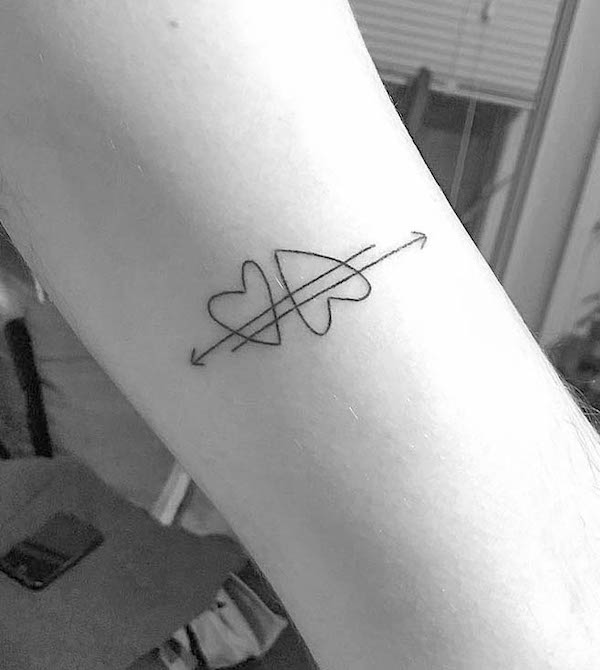 Hearts and arrow tattoo by @efg_art