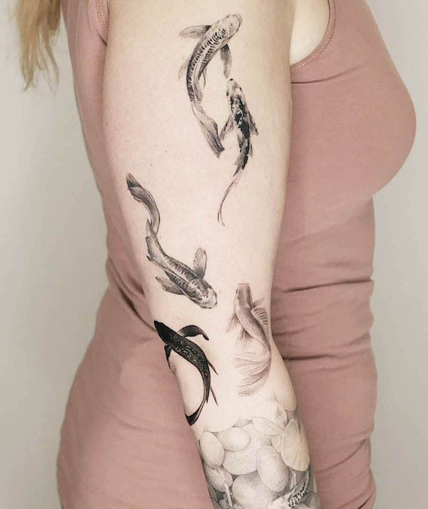 Koi fish full sleeve tattoo by @thommesen_ink