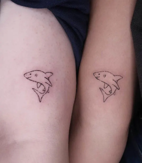Matching simple shark tattoos by @tinybaki.jpg