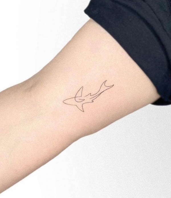 Minimalist single-line shark tattoo by @southcitymarket