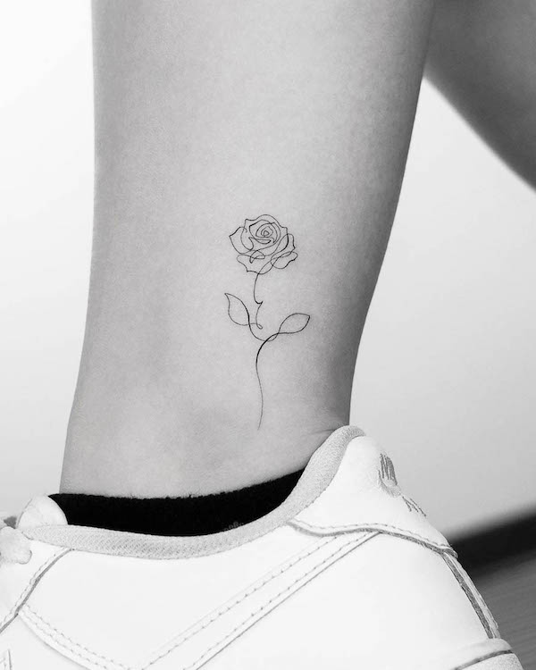 Single-line rose tattoo by @jk.tattoo