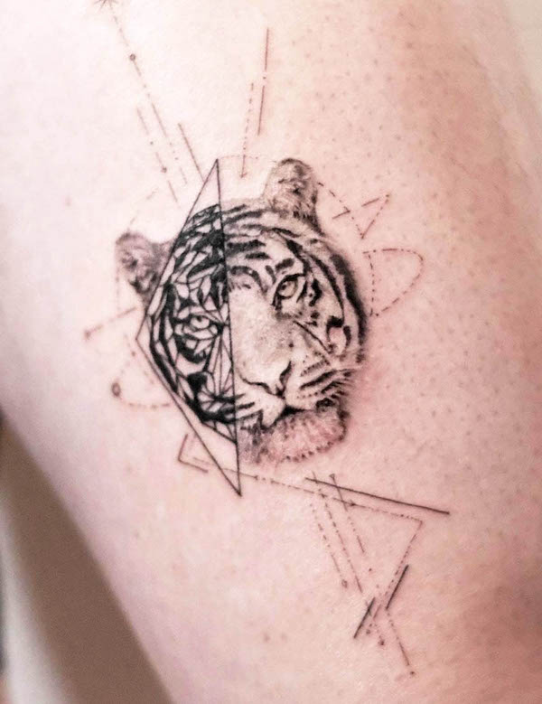 Small geometric tiger tattoo by @black_zada_tattoo
