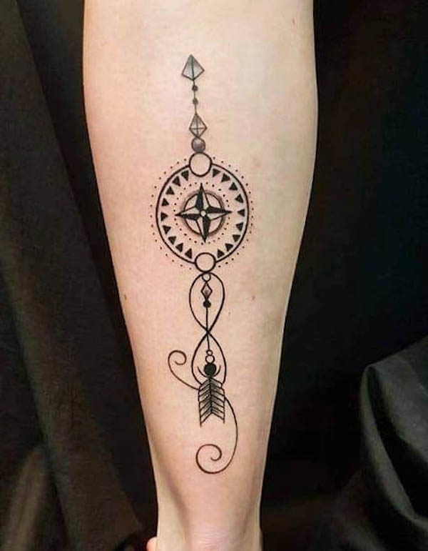 Symbolic compass and arrow tattoo by @tattoobobshop