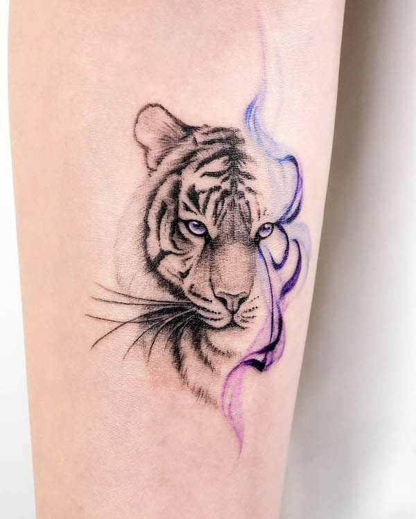 Whimsical tiger tattoo by @77.9tattoo