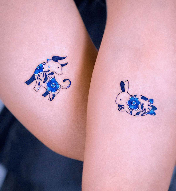 Chinese zodiac matching tattoos by @e.nal .tattoo