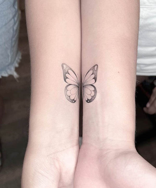 Matching butterfly wrist tattoos by @nico_artattoo