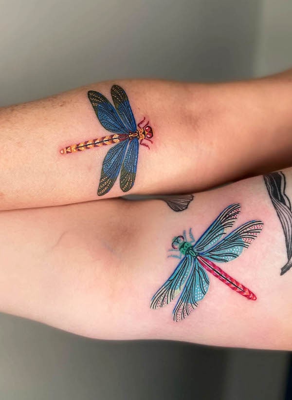 Matching dragonfly tattoos for mother and daughter by @laurenblairtattoo