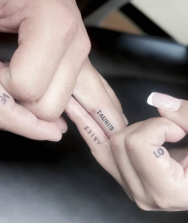 Matching zodiac finger tattoos by @houseofpigmentation