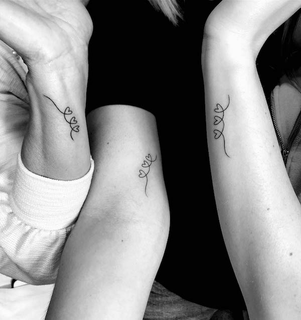Small hearts mother daughter tattoos by @mayflowerink