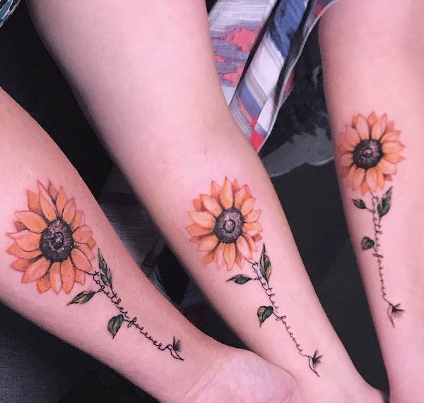 Sunflower forearm tattoos for mother daughter trio by @rosey