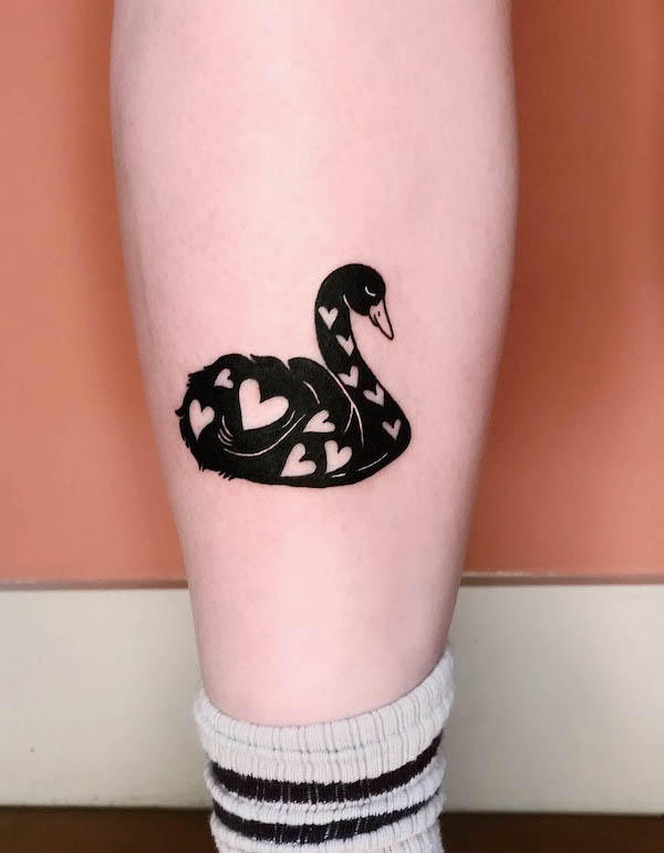 Black swan with hearts tattoo by @byyclouds