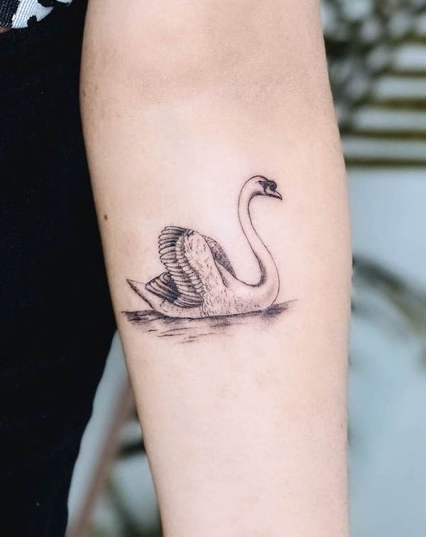 Detailed swan forearm tattoo by @jimmygalan
