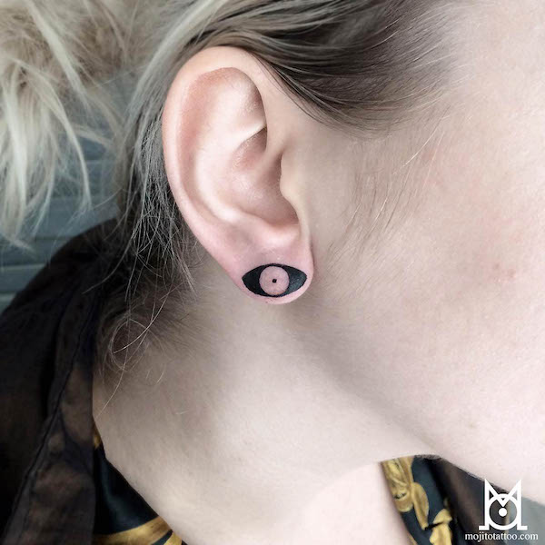 Eye on the earlobe tattoo by @morganejeane