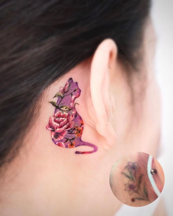 Floral cat cover-up tattoo by @o.ri_tattoo