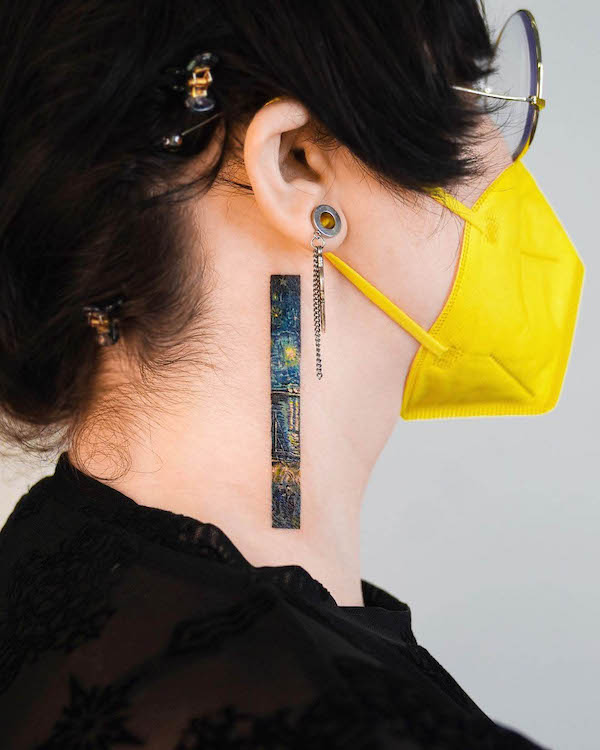 Starry Night stripe behind the ear by @tattooist_eq