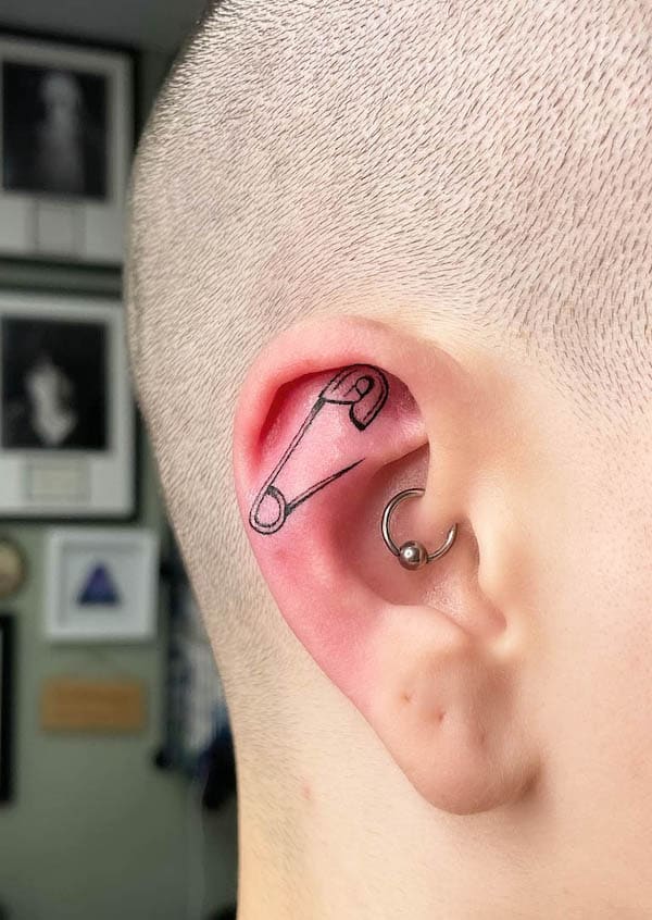 Pin on the ear tattoo for men by @rhi.draws