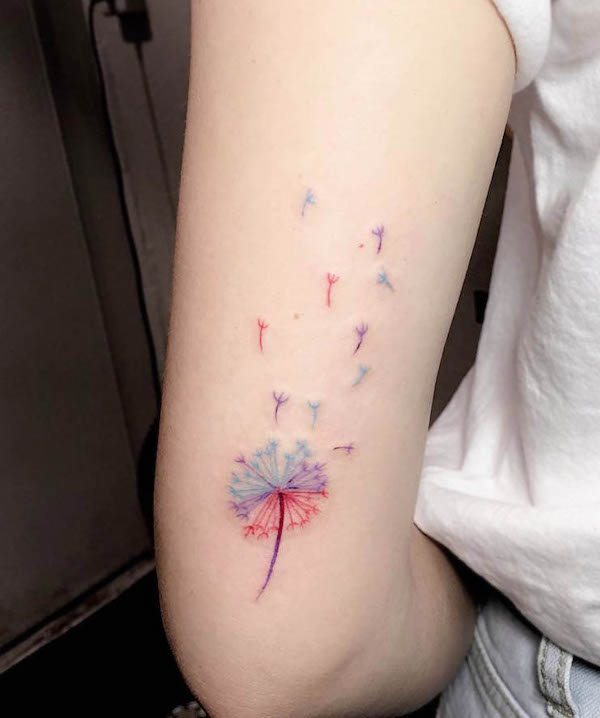 Cute dandelion upper arm tattoo by @wei_ca