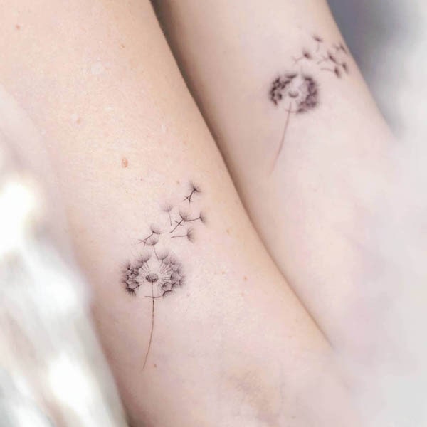 Matching dandelion tattoos by @maliartattoo