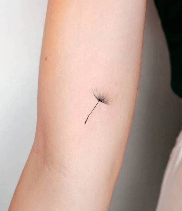 Small dandelion seed tattoo by @maliartattoo