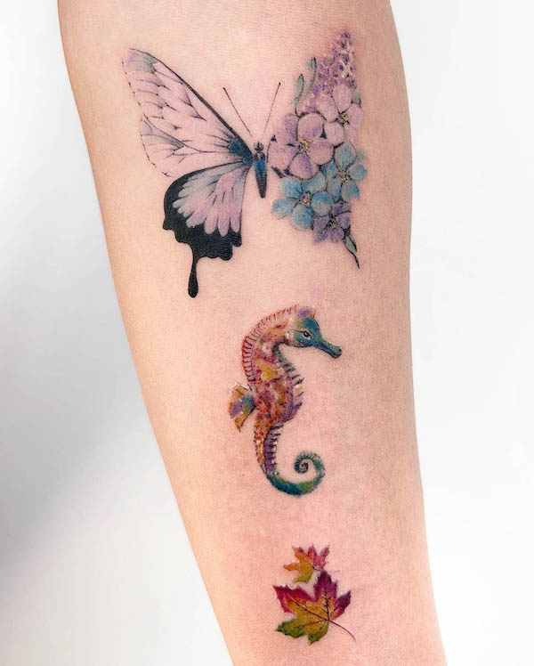 seahorse tattoo on a female shoulder by Norma Stamp