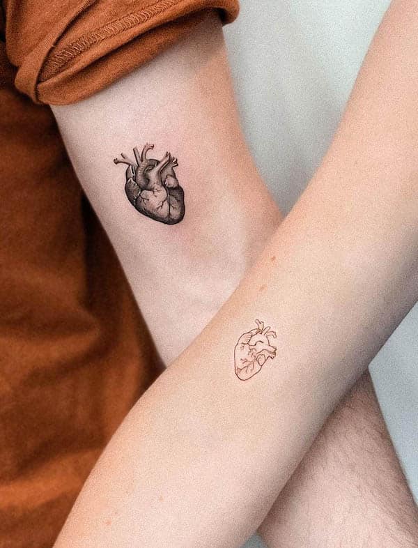 Two-style heart tattoos by @acaldeira.ink